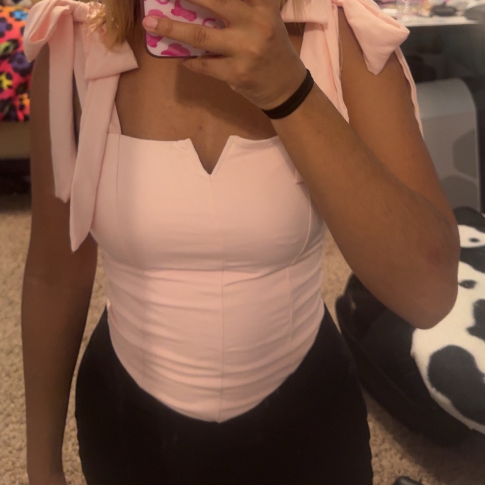 Baby pink bodysuit with bow sleeves